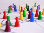 Several small plastic pins connected by black lines