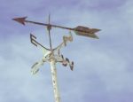 A close-up of a weathervane